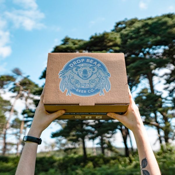 Holding up Drop Bear Box Image